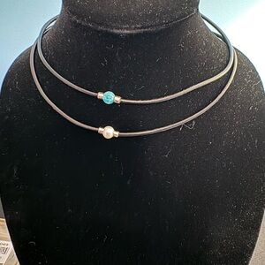 Set of 2 necklaces.